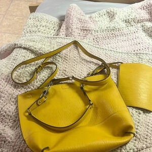 Calvin Klein few spots well loved pvc material.